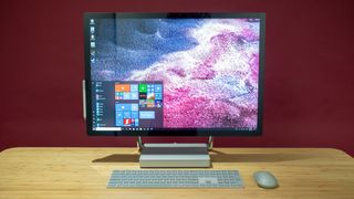 Surface Studio 2 on a wooden desk