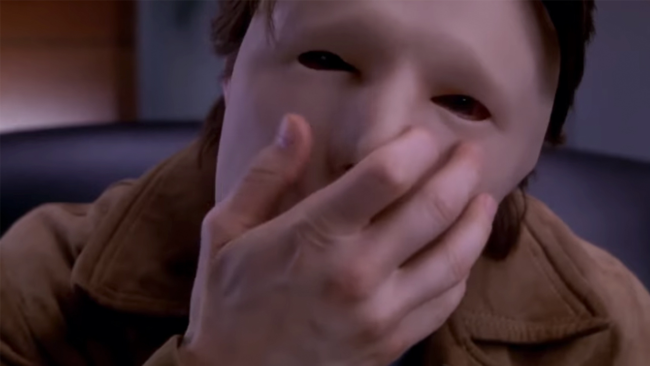 Tom Cruise behind a prosthetic face in Vanilla Sky