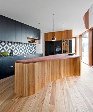 Modern kitchen island with wood slat island