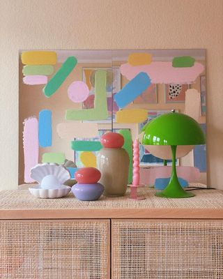 Pastel mirror with other colorful decor