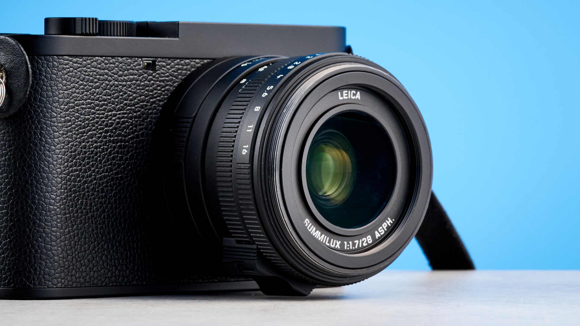 A black Leica Q3 Monochrom black-and-white mirrorless camera