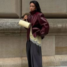 Caroline Lin wearing a The Frankie Shop jacket