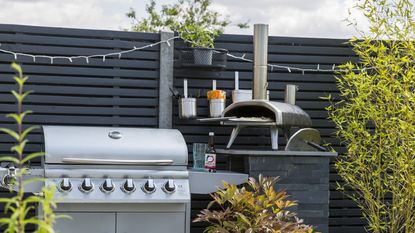 How much does it cost to run a pizza oven - a gas fuelled pizza oven in a contemporary outdoor kitchen set up