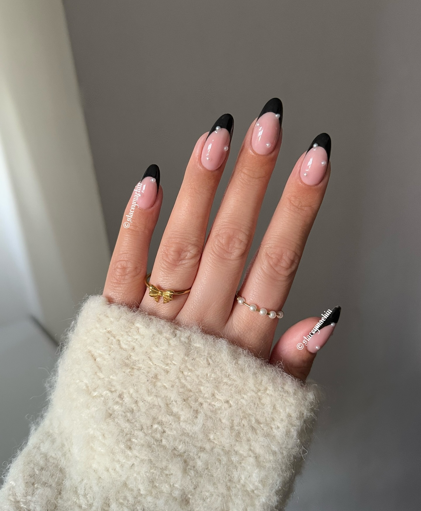Stacey Machin black french nail tips with pearl details