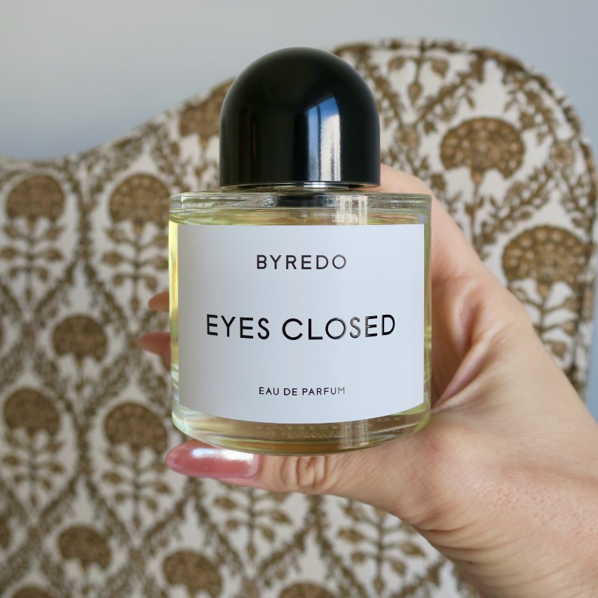 Brianna Peters testing Byredo Eyes Closed fragrance.