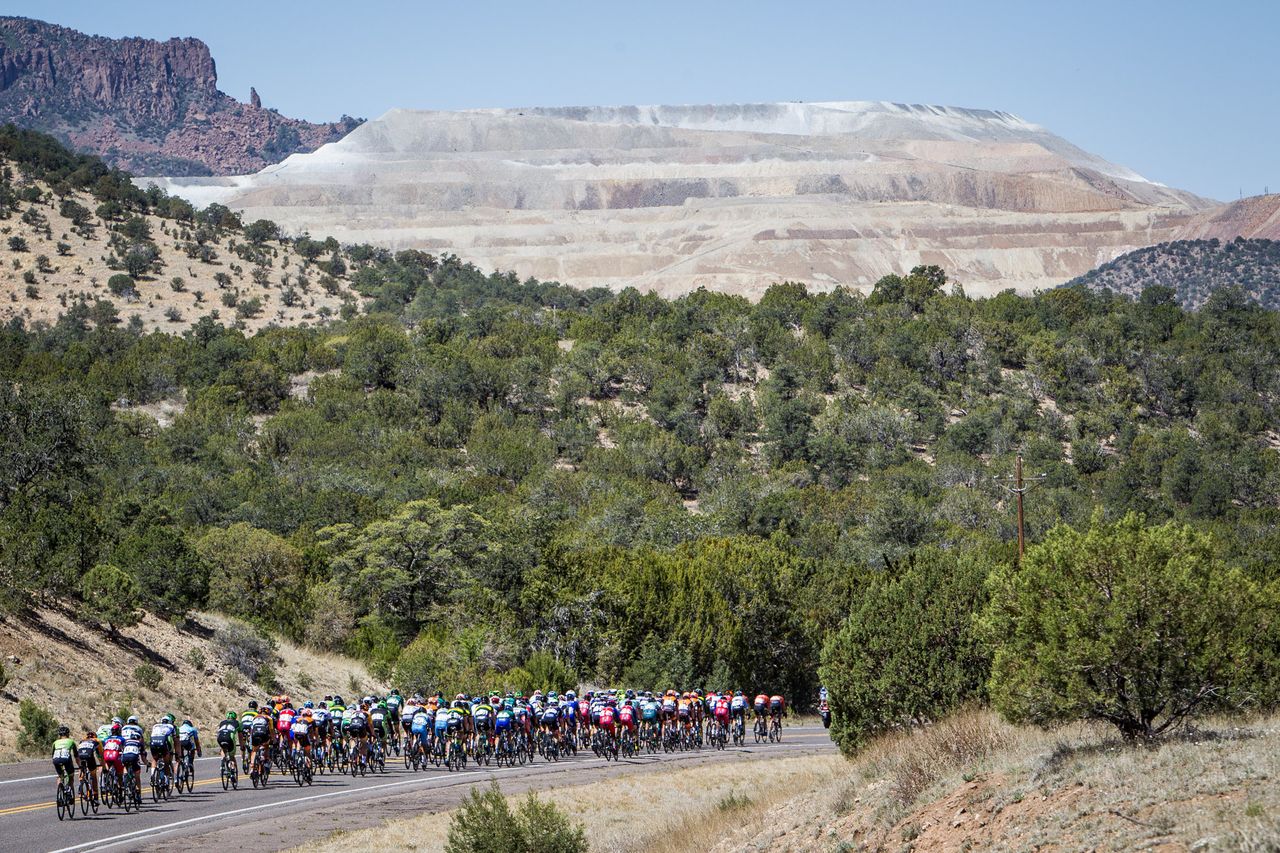 The peloton passes by the Santa Rita mine.