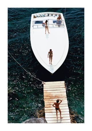 A Magnum motorboat belonging to Count Filippo Theodoli arriving at the private jetty of the Il Pellicano Hotel in Porto Ercole, Italy, 1973.