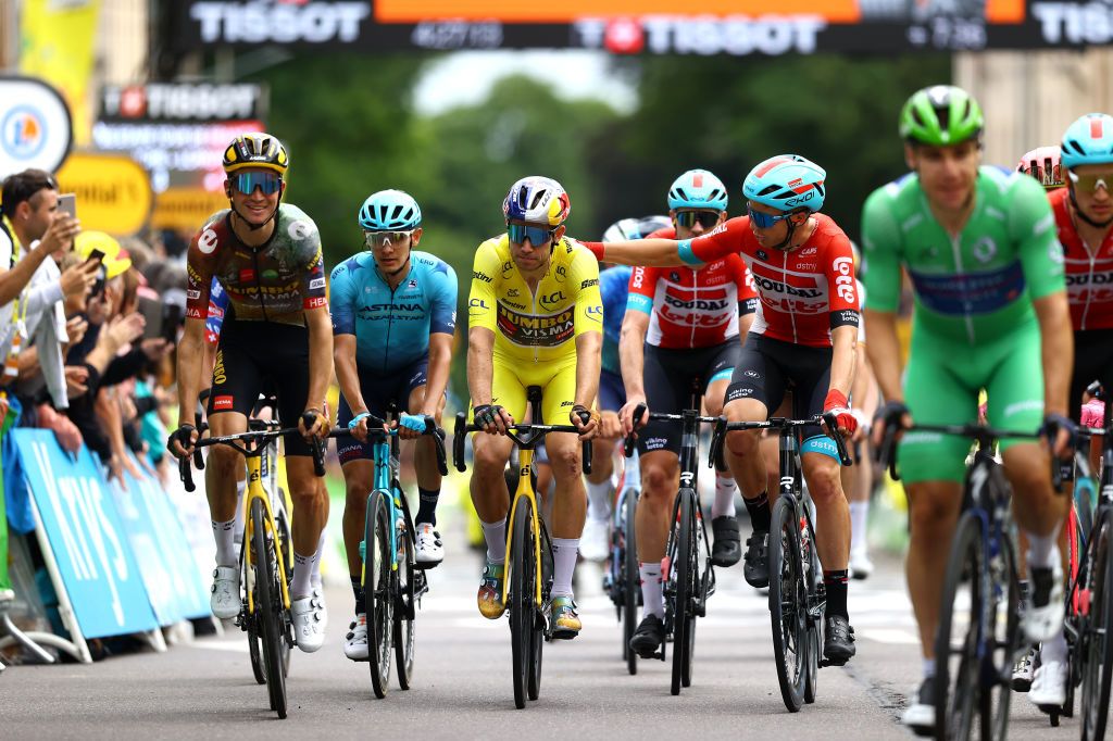 LONGWY FRANCE JULY 07 LR Sepp Kuss of United States and Team Jumbo Visma Aleksandr Riabushenko of Russia and Team Astana Qazaqstan Wout Van Aert of Belgium and Team Jumbo Visma Yellow Leader Jersey react disappointed on arrival and Florian Vermeersch of Belgium and Team Lotto Soudal during the 109th Tour de France 2022 Stage 6 a 2199km stage from Binche to Longwy 377m TDF2022 WorldTour on July 07 2022 in Longwy France Photo by Michael SteeleGetty Images