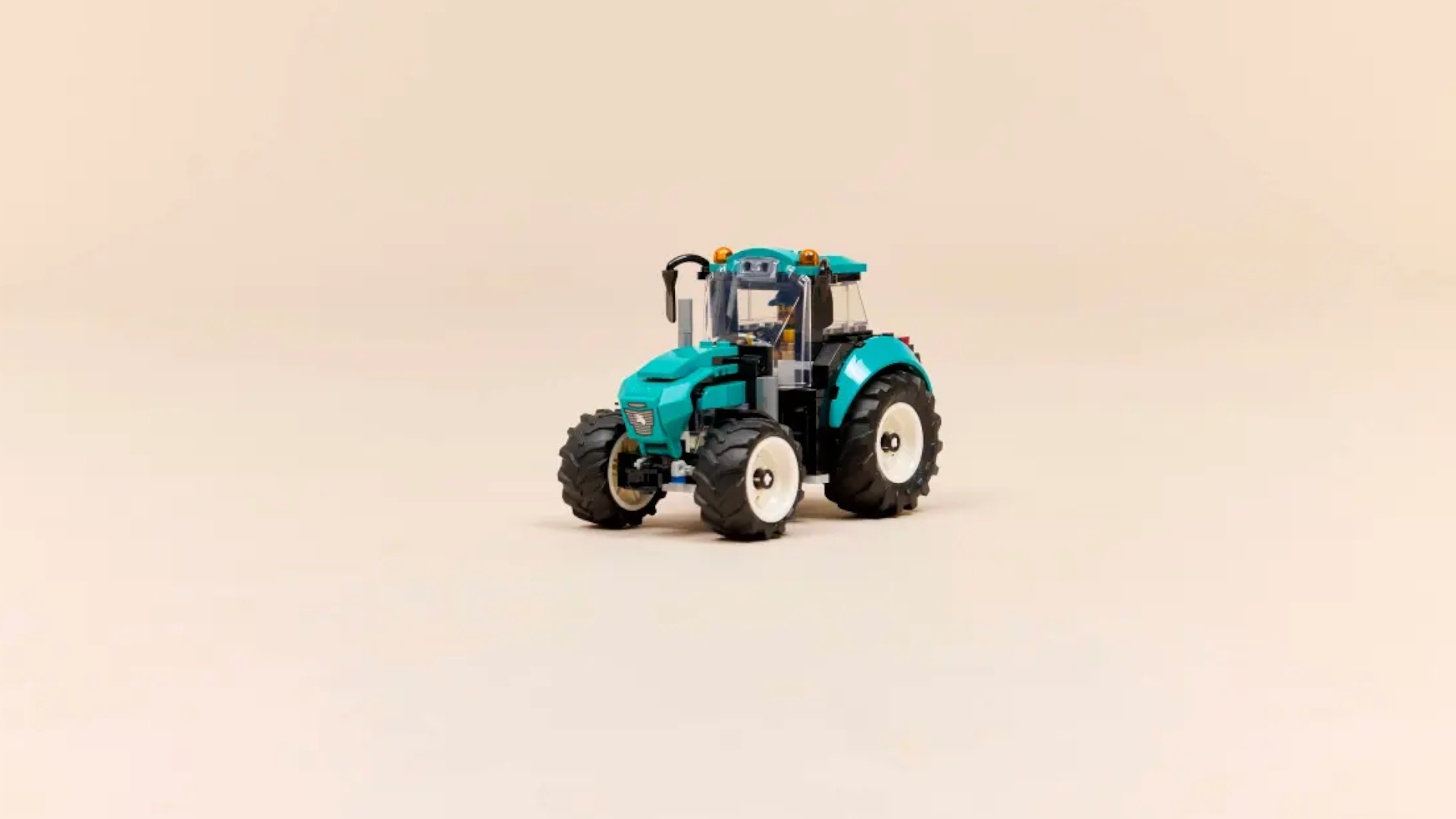 Lego Tractor on a salmon-colored background