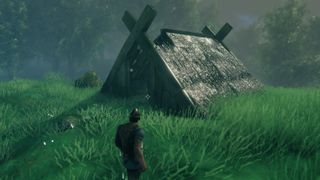 Valheim beginner tips - a run-down wooden hut in a grassy field
