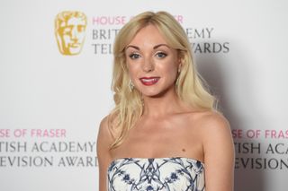 Helen George poses in the Winners room at the House Of Fraser British Academy Television Awards 2016