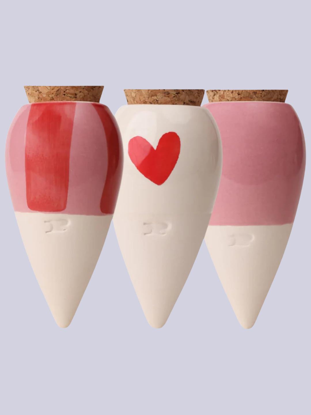 A set of three pink and red ollas from Pepin