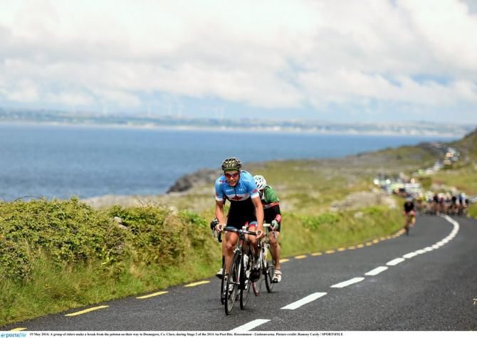 A group of riders make a break from the peloton on their way to Doonagore, Co. Clare