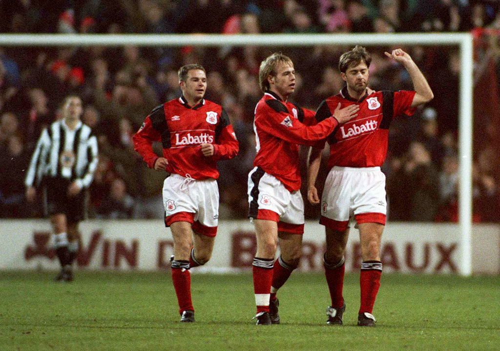 Ian Woan and Paul McGregor of Nottingham Forest celebrate during the Premier League match between Nottingham Forest and Newcastle United at City Ground on May 1, 1996 in Nottingham, England. 