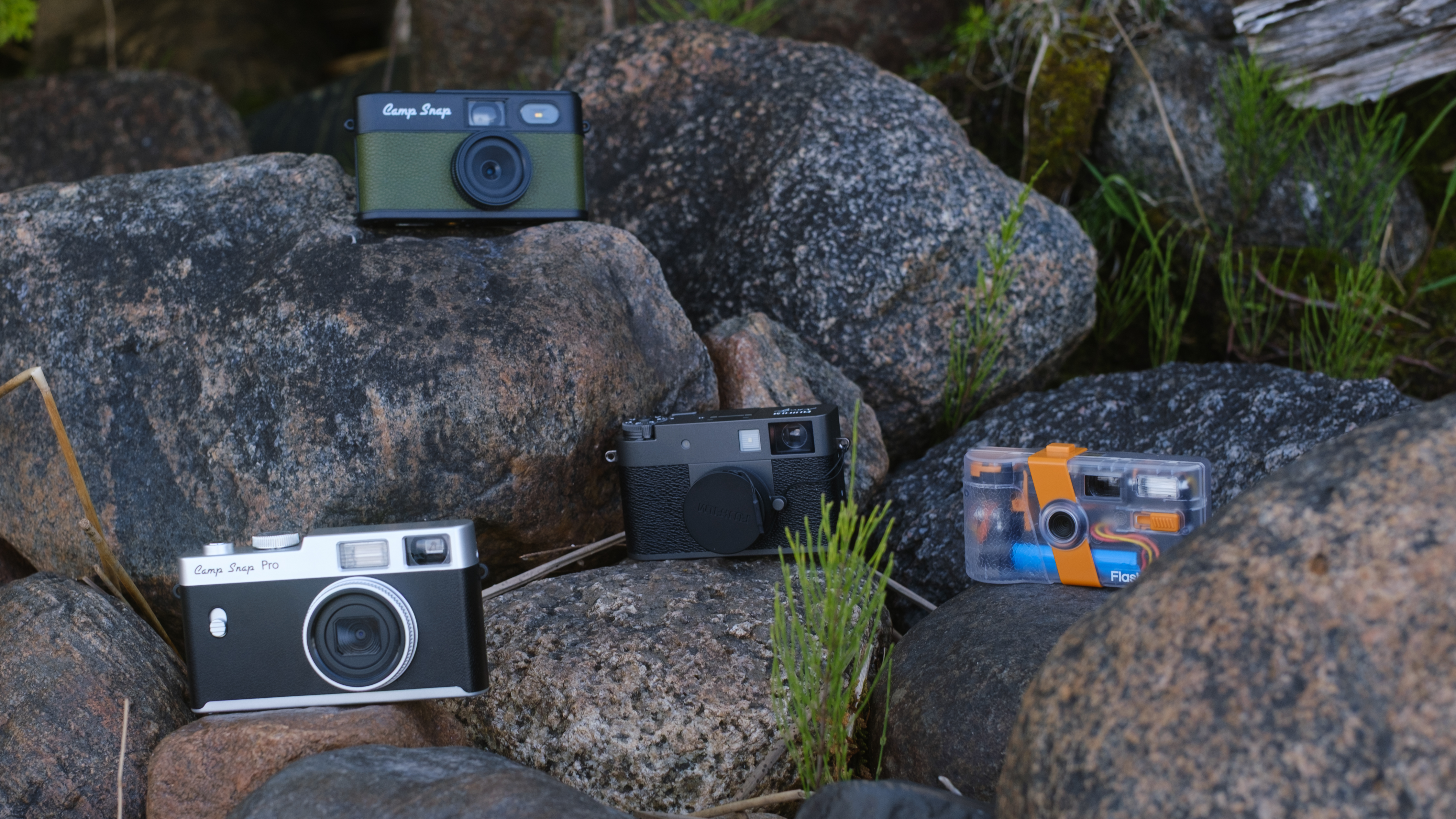 An assortment of different screen-free digital cameras