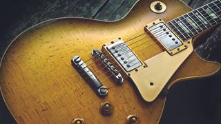A close-up of a Gibson Les Paul Standard guitar