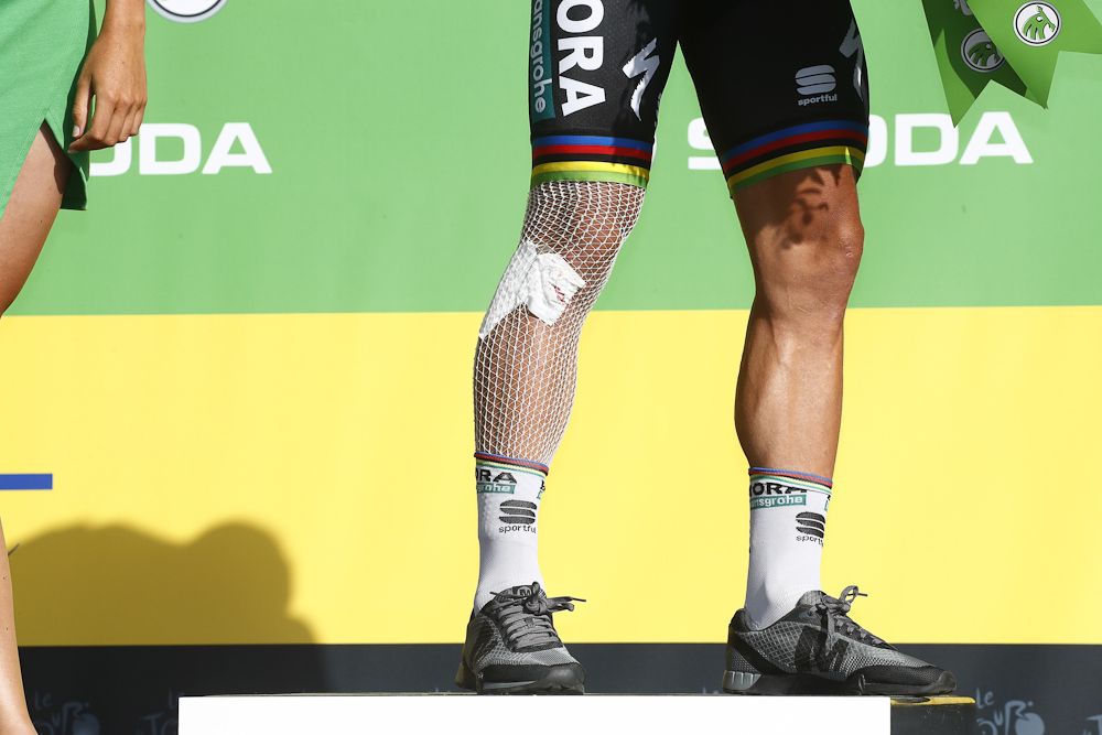 Peter Sagan on the podium following his stage 17 crash at the Tour de France