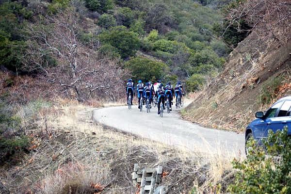Johan Bruyneel follows the team closely with extra clothing and equipment.