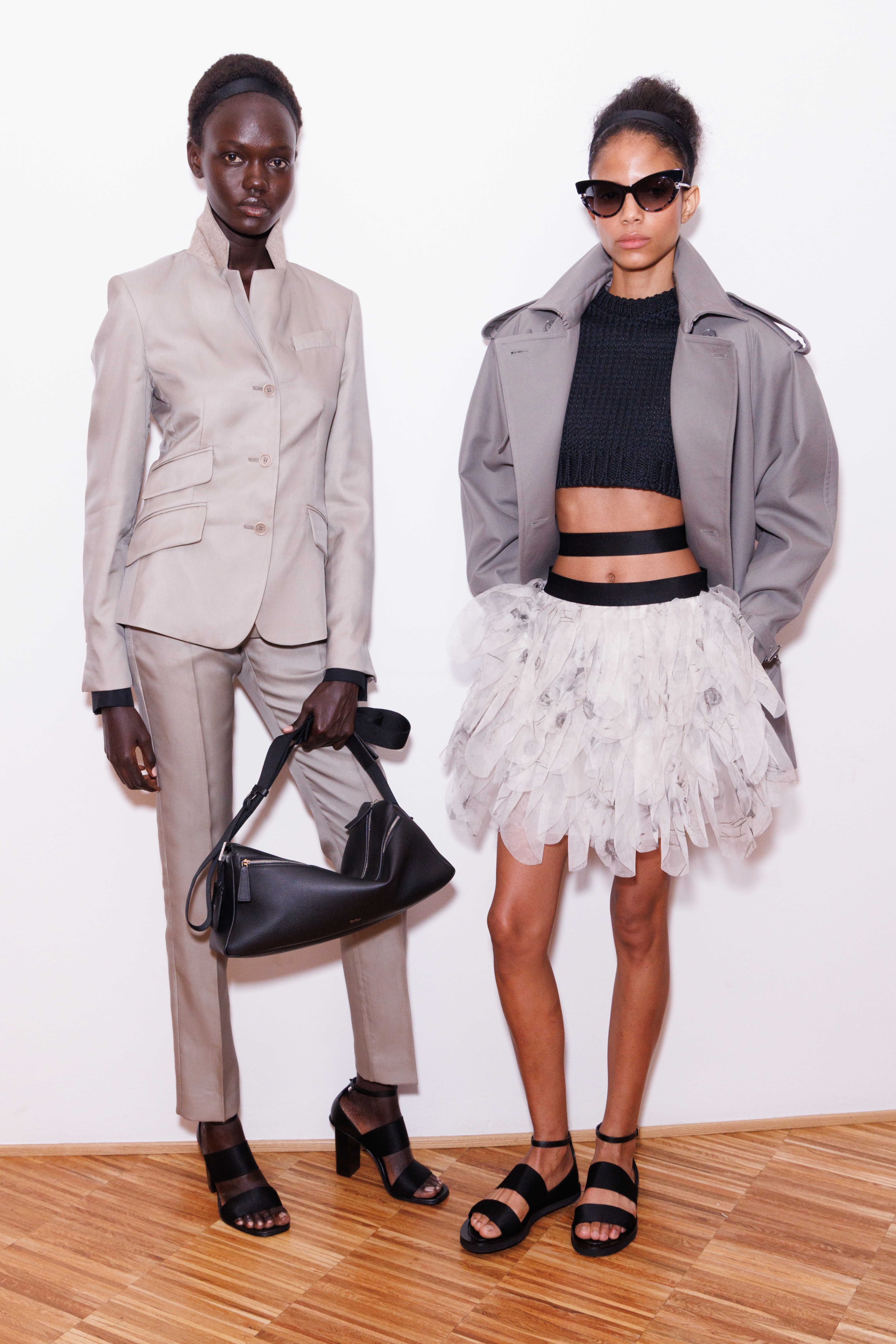 two models backstage at the max mara ss26 show