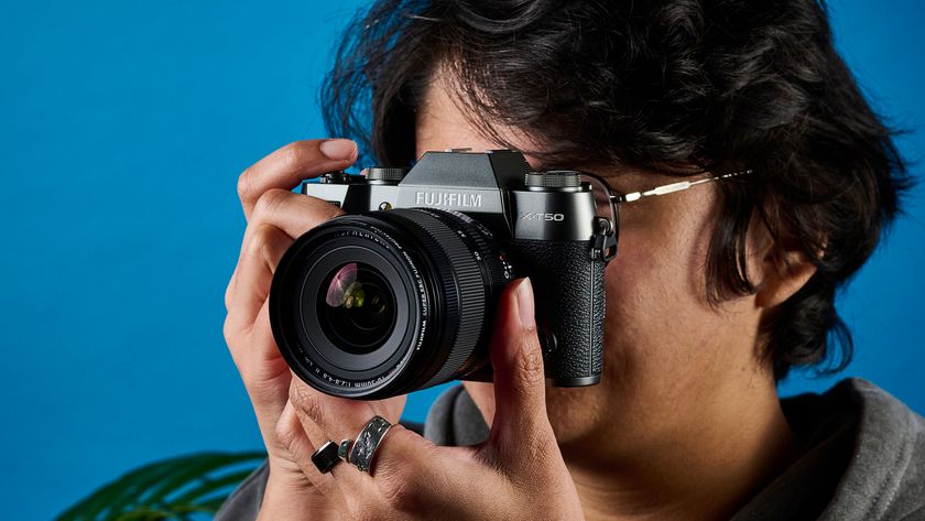 A Fujifilm X-T50 camera in the charcoal grey colorway