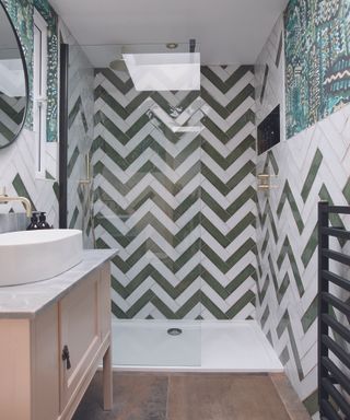 Green and white zig-zag shower tile idea in bathroom
