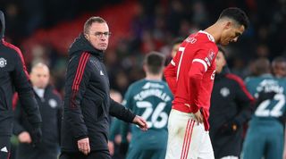 Ralf Rangnick and Cristiano Ronaldo leave the pitch after Manchester United's loss to Middlesbrough on penalties in the FA Cup.