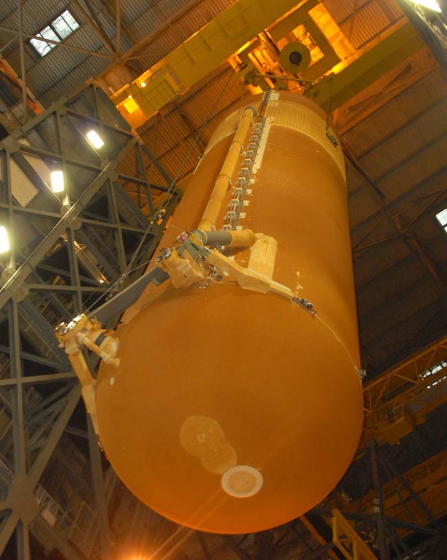 NASA Attaches Rocket Boosters to Repaired Shuttle Fuel Tank