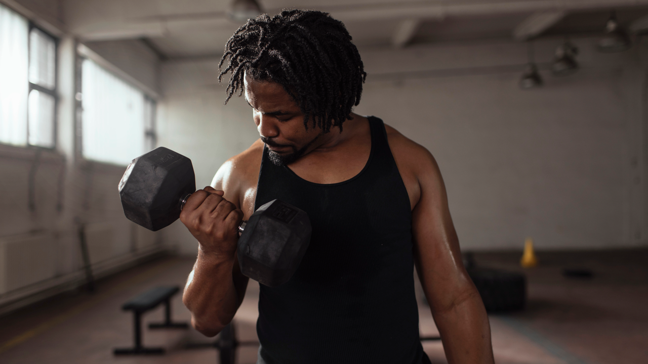 Man doing dumbbell bicep curl