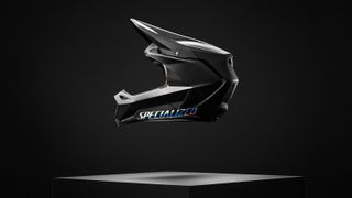 Specialized's new Dissident 2 full-face helmet pictured from the side floating above a platform