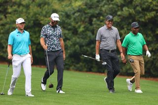Varner, Mickelson, Johnson and Gooch walk during a practice round at The Masters