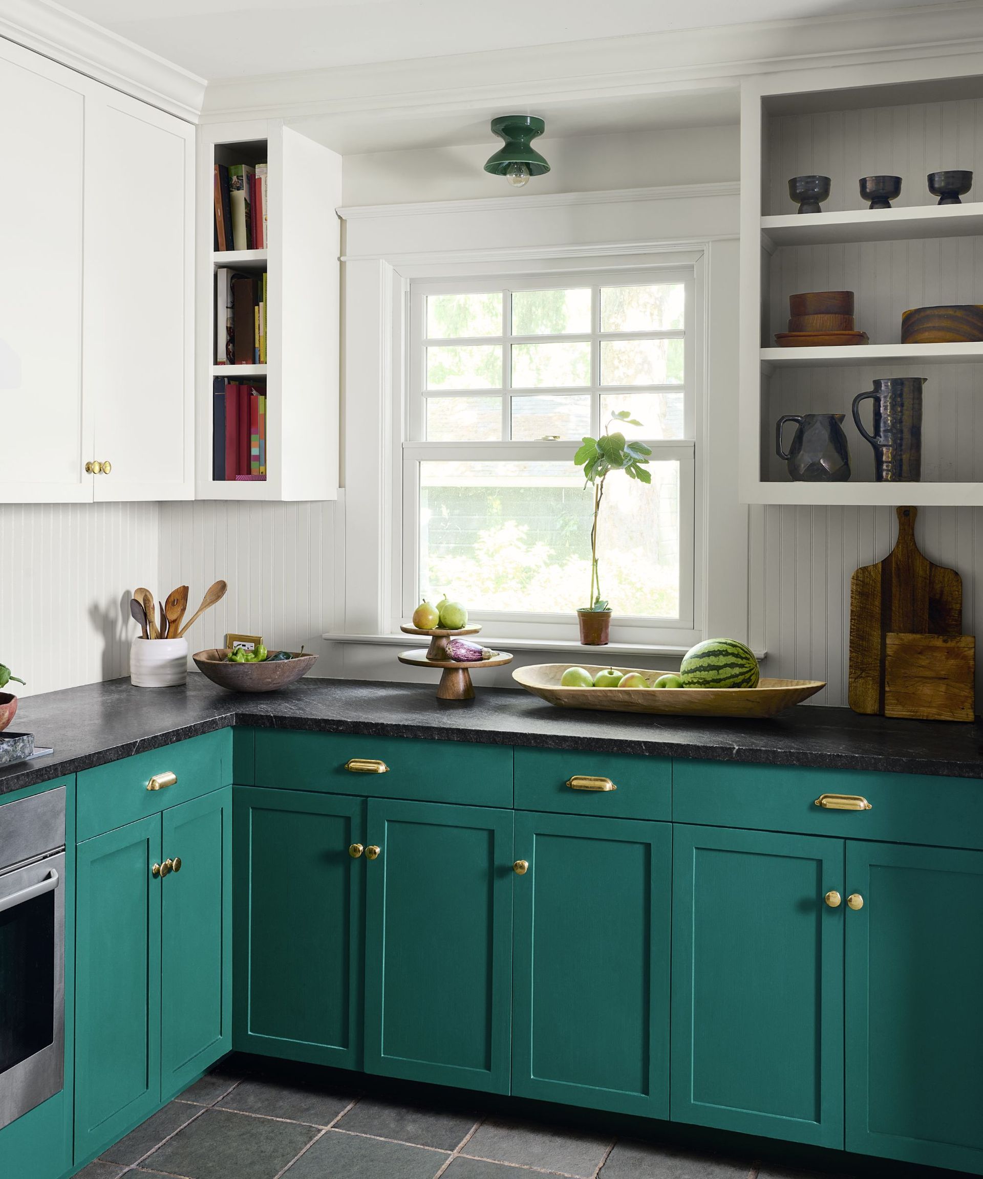 White and green two-tone kitchen cabinets