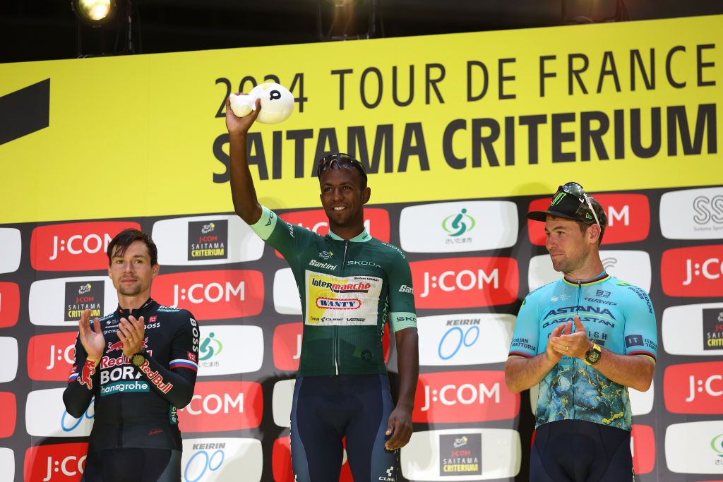 SAITAMA JAPAN NOVEMBER 02 LR Primoz Roglic of Slovenia and Team Red Bull Bora Hansgrohe on second place race winner Hailu Biniam Girmay of Eritrea and Team Intermarche Wanty Green Sprint Jersey and Mark Cavendish of The United Kingdom and Astana Qazaqstan Team on third place pose on the podium ceremony after the 10th Tour de France Saitama Criterium 2024 Criterium Race a 612km one day race from Saitama to Saitama on November 02 2024 in Saitama Japan Photo by Rhode Van ElsenGetty Images