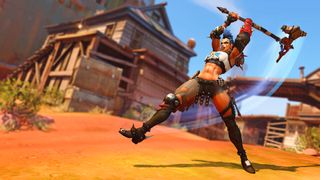 Junker Queen swings a hammer towards the ground in Overwatch 2