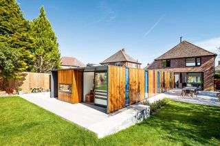 Colourful extension to detached house