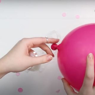 white background with pink balloon