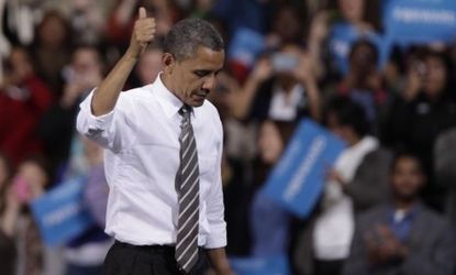 Obama gives a thumbs up after speaking to supporters at the Stroh Center on Sept. 26 in Bowling Green, Ohio. The president gets the thumbs up from most Americans, who say he'll win the first 