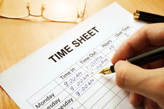 Time being entered in a time sheet to keep record