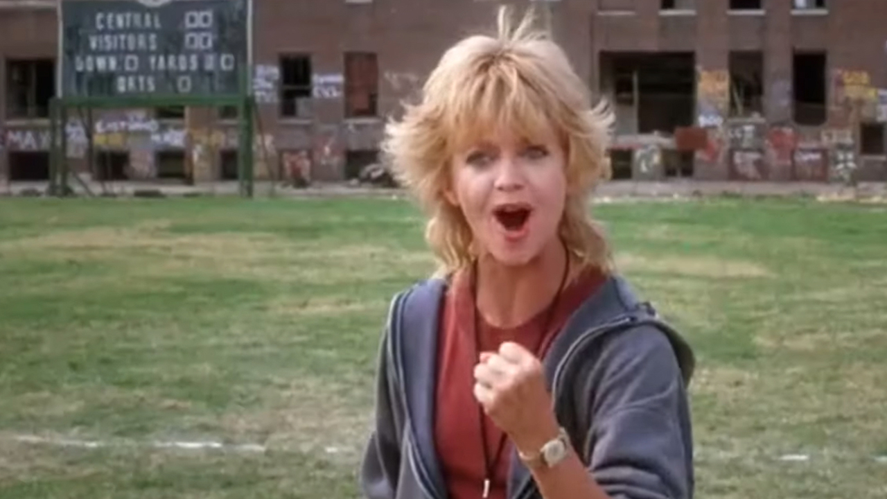 Goldie Hawn pumping her fist in athletic clothes in Wildcats