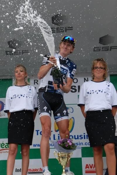 Gustav Larsson (Saxo Bank) lets loose with the bubbly after winning stage two..