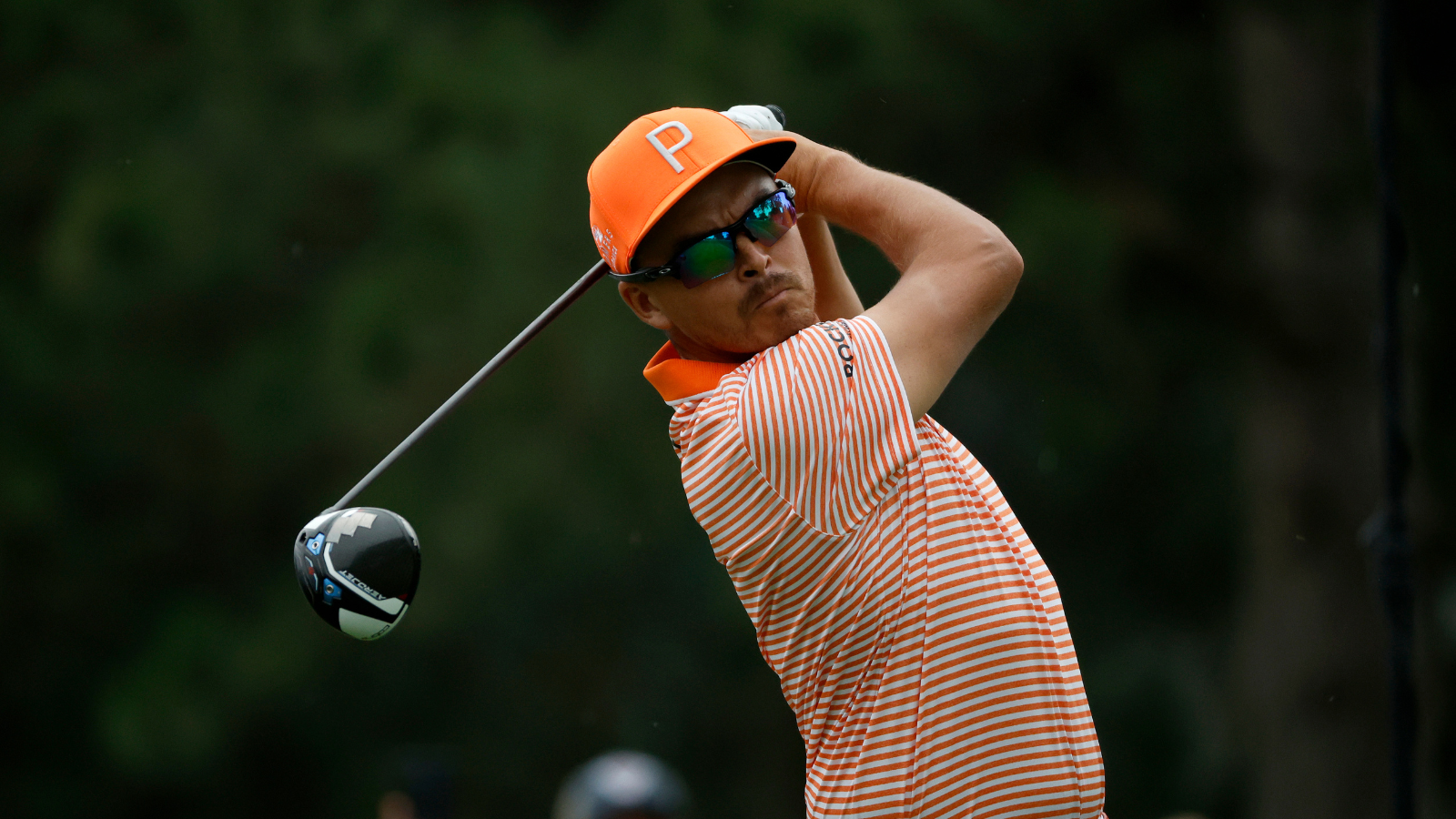 Rickie Fowler playing at the Rocket Mortgage Classic earlier in July