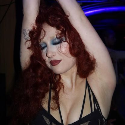 Chappell Roan wrapped Paris Fashion Week in a sheer bra, under-bust corset, and micro-shorts