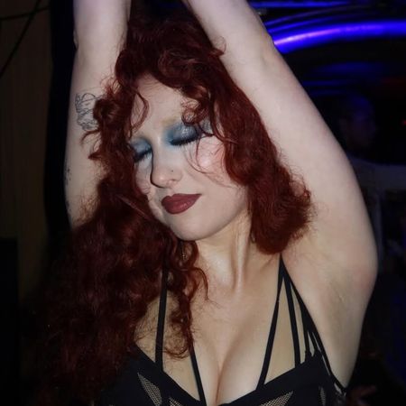 Chappell Roan wrapped Paris Fashion Week in a sheer bra, under-bust corset, and micro-shorts