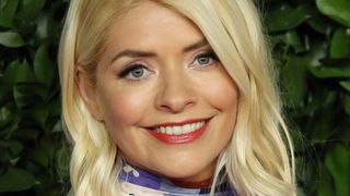 Holly Willoughby pictured with wavy curly hair