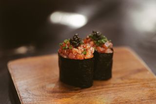 sushi on wooden board
