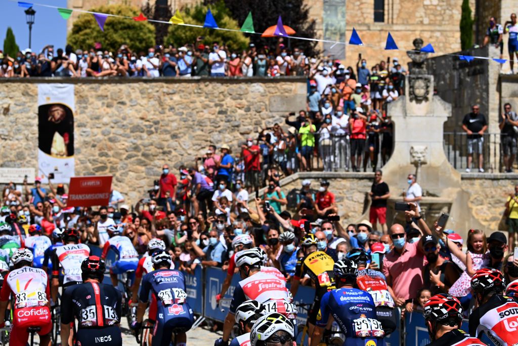 BURGOS SPAIN AUGUST 15 The peloton passing through Caleruega village landscape during the 76th Tour of Spain 2021 Stage 2 a 1667km stage from Caleruega Monasterio de Santo Domingo de Guzmn to Burgos Gamonal lavuelta LaVuelta21 CapitalMundialdelCiclismo on August 15 2021 in Burgos Spain Photo by Stuart FranklinGetty Images