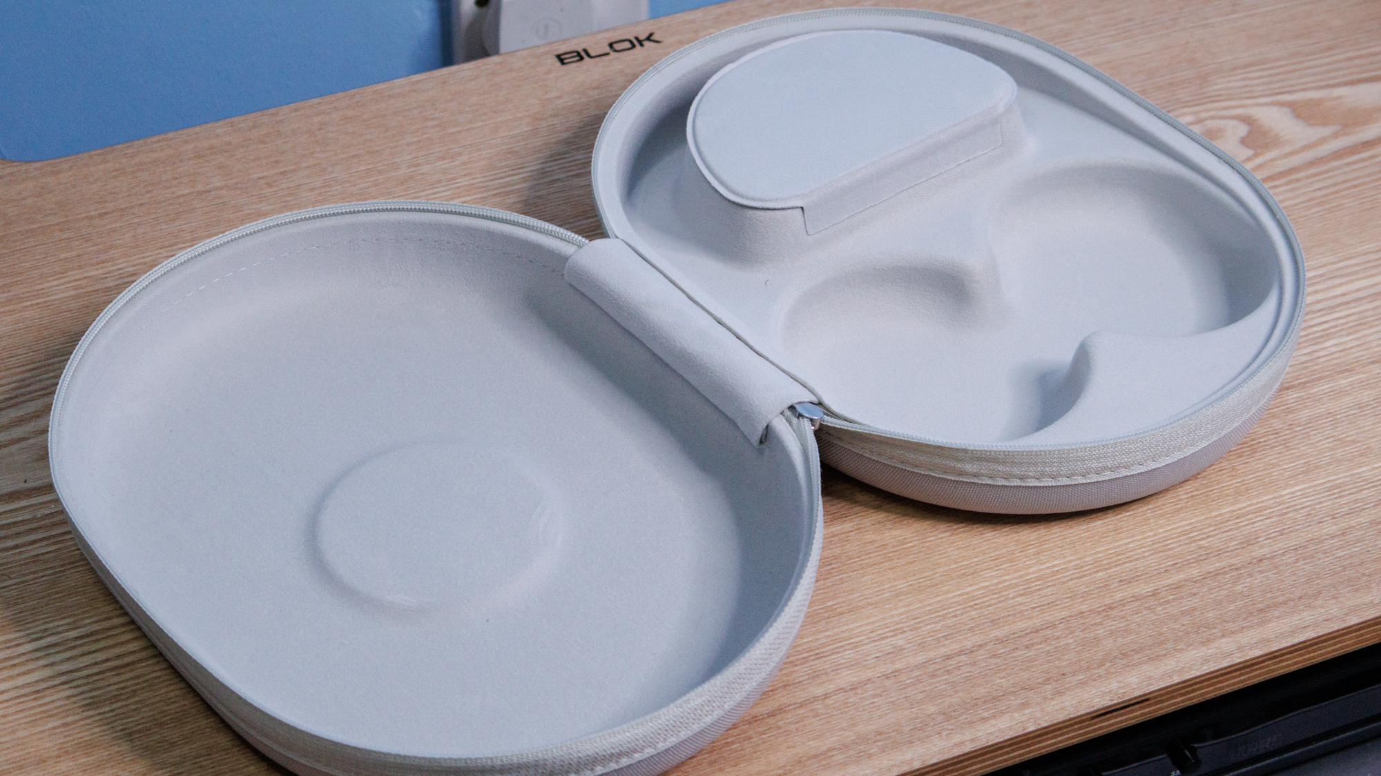 Cambridge Audio Melomania P100 SE headphones case open on a table.
