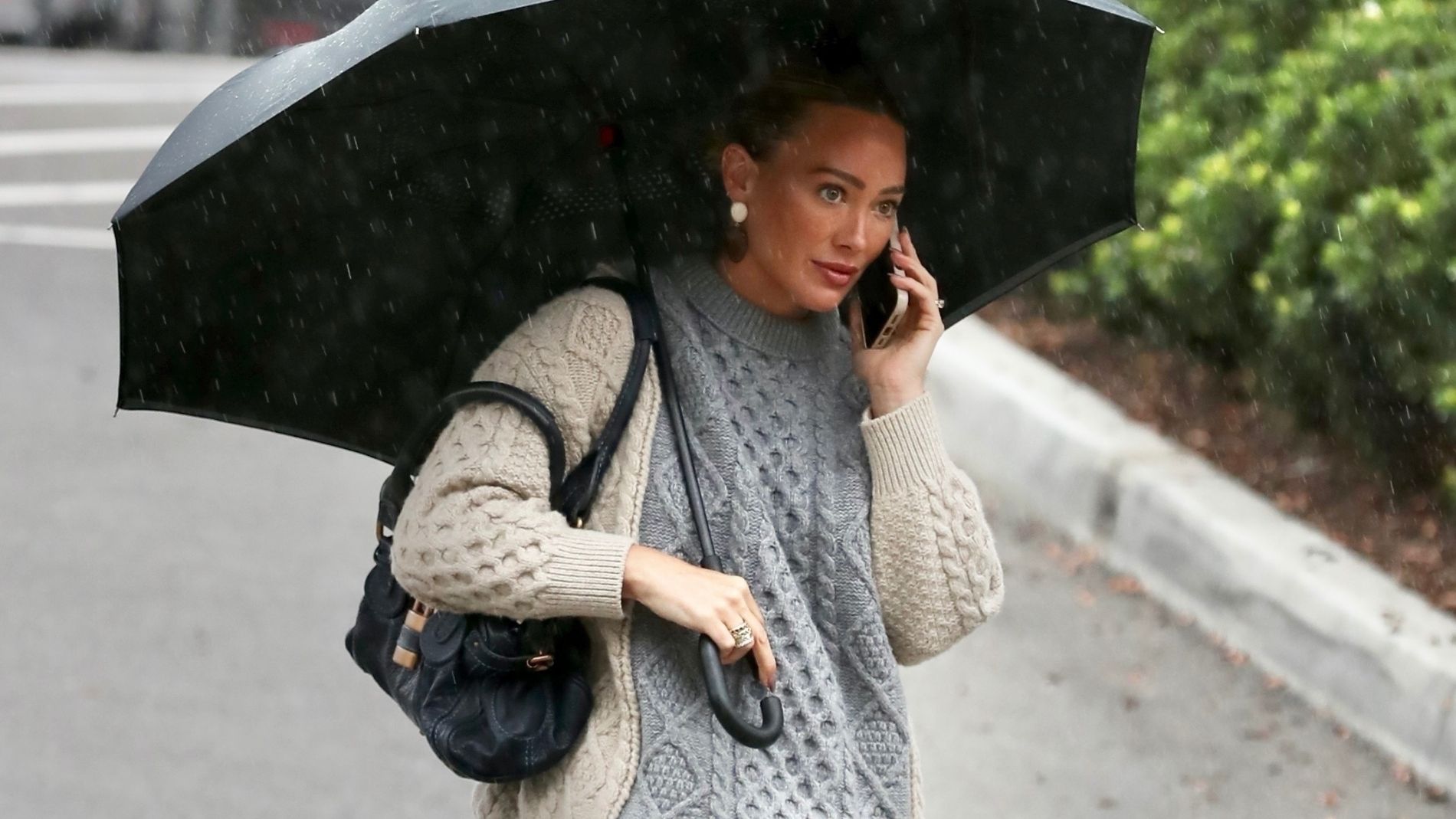 Hilary Duff and an umbrella