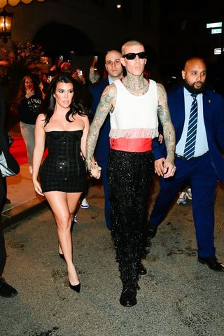 Kourtney Kardashian and Travis Barker are seen in leaving a hotel in midtown on May 3, 2022 in New York City