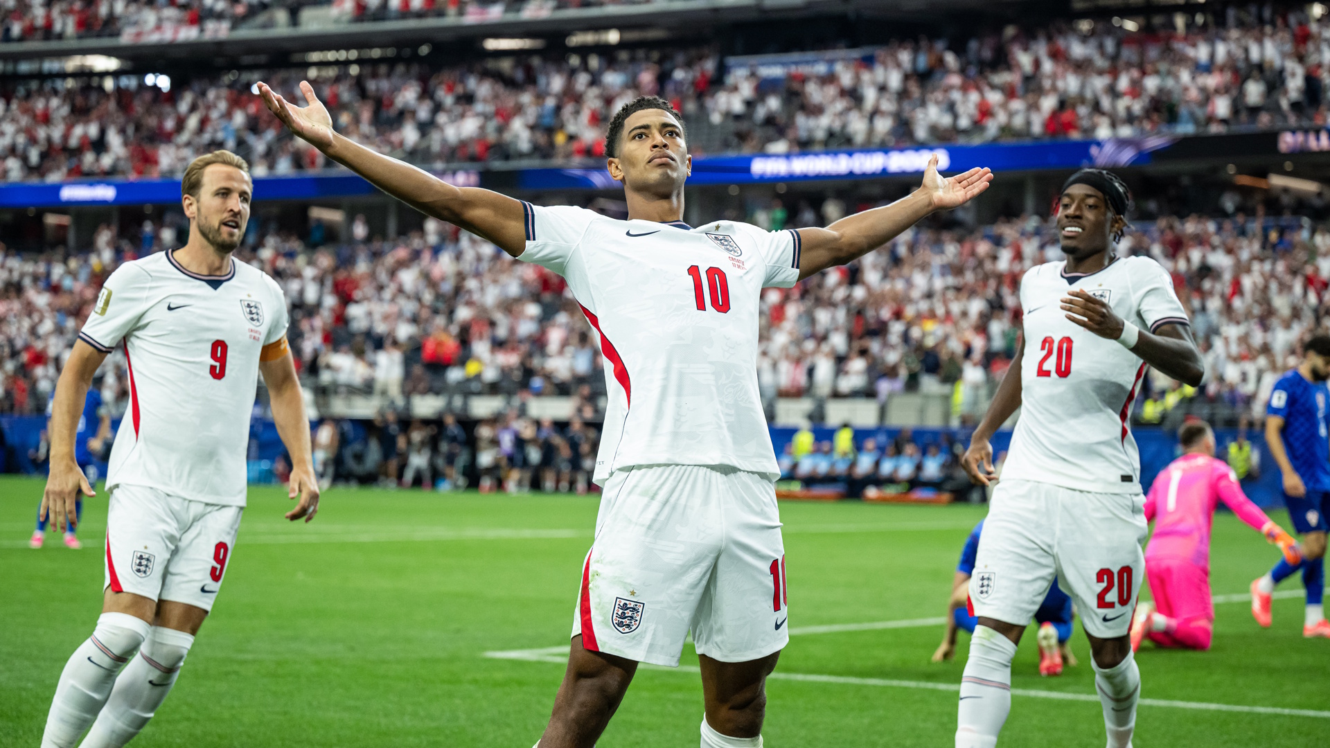 Jude Bellingham of England celebrates with Harry Kane and Noni Madueke after scoring a goal during the FIFA World Cup 2026.