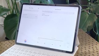 The Xiaomi Pad 7 Pro on a bronze table